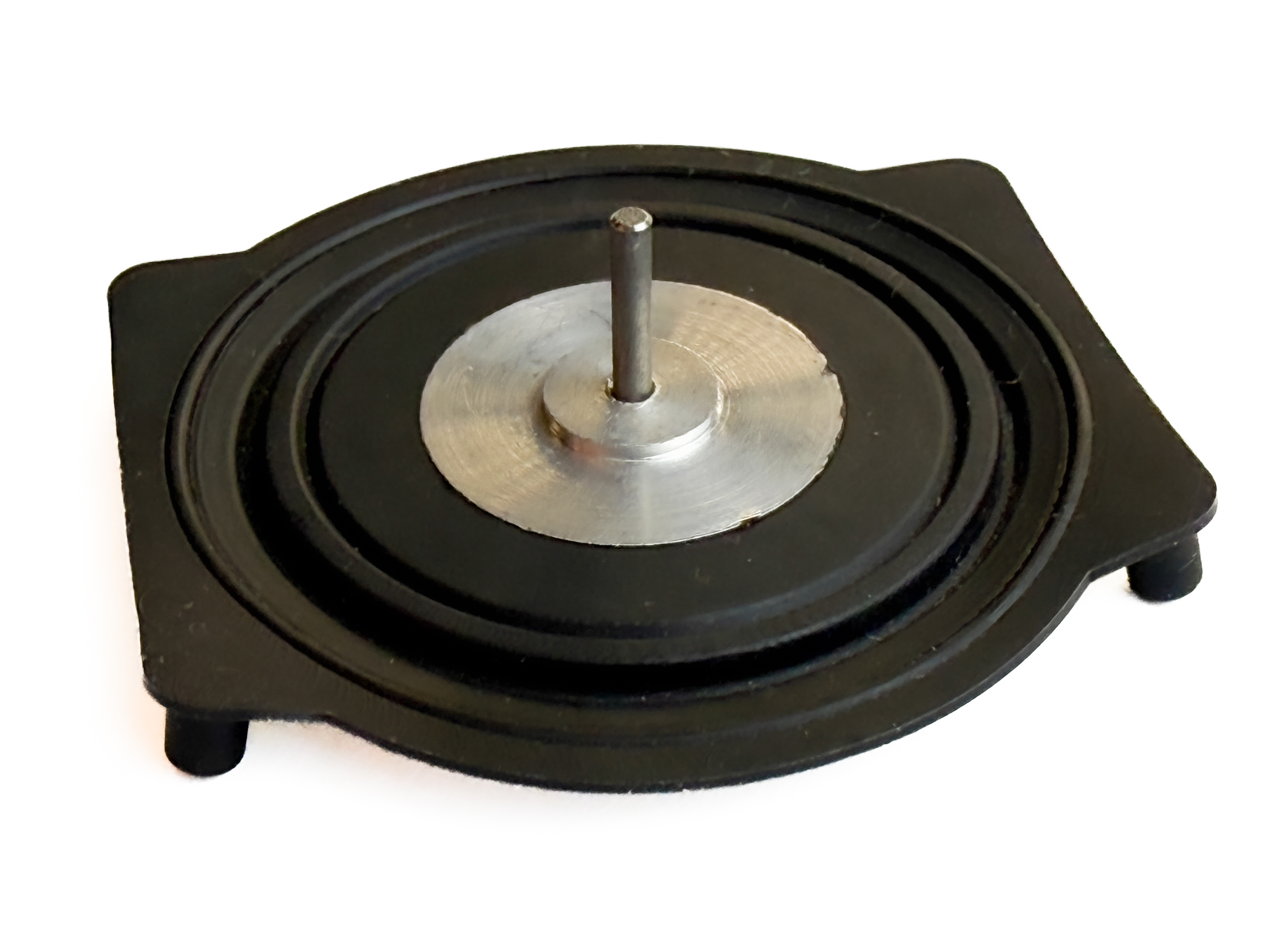 Custom overmolded components from Canyon Components designed for enhanced grip, vibration damping, and durability.