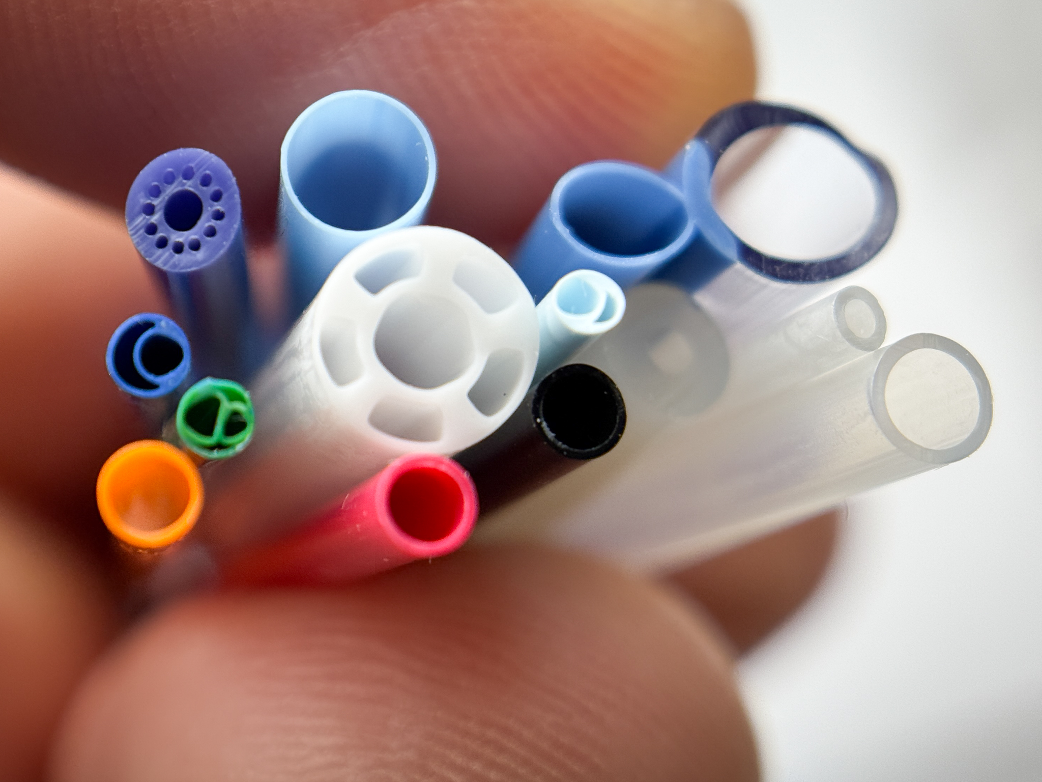 Precision micro-extrusion services from Canyon Components for intricate medical device components, electronic connectors, and sealing profiles.